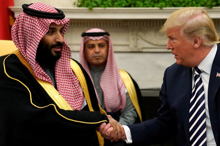 U.S. President Donald Trump shakes hands with Saudi Arabia's Crown Prince Mohammed bin Salman in the Oval Office on March 20, 2018.