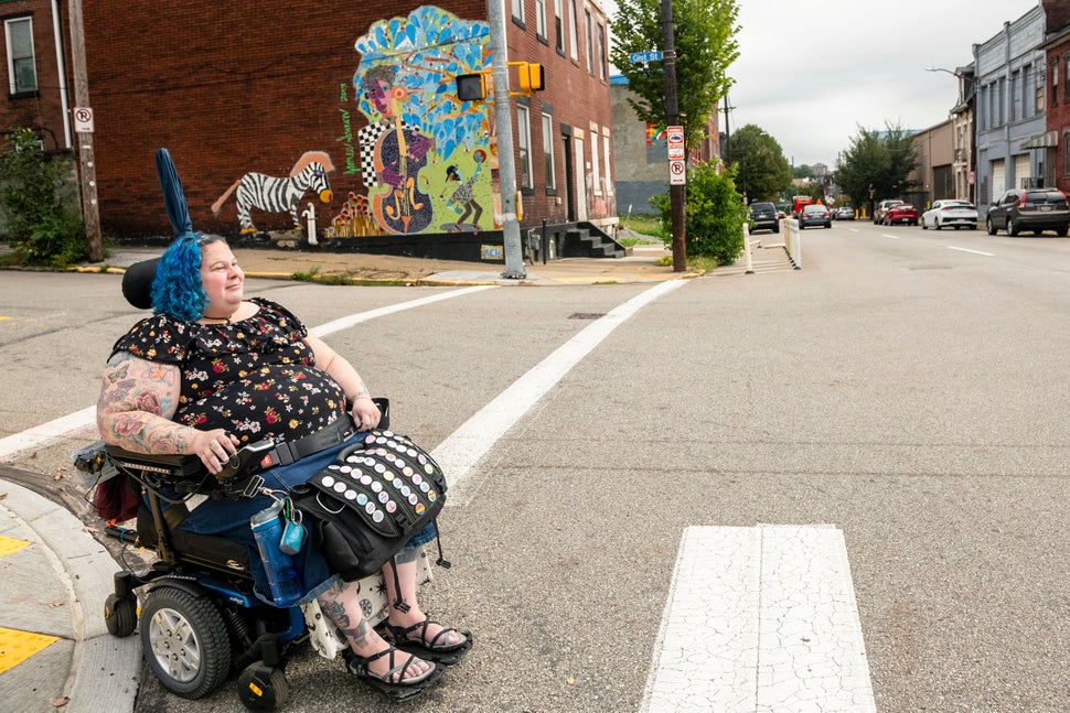 To cross streets, Grishman has to use crosswalks where there is an incline for her wheelchair.<i></i><i></i>
