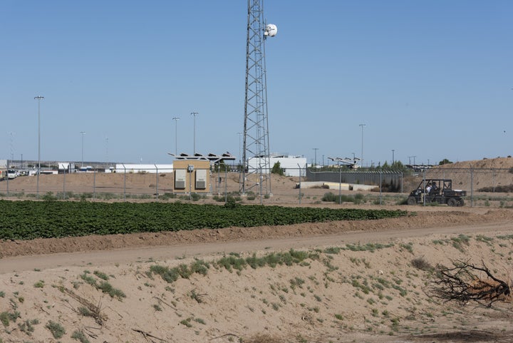 Security officers patrol the perimeter of the tent encampment near the Tornillo Port of Entry in West Texas. It was initially built to house 400 children. Now nearly 4,000 are detained there.