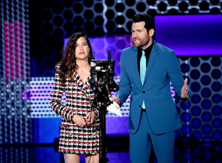 Kathryn Hahn and Billy Eichner speak onstage during the 2018 American Music Awards.