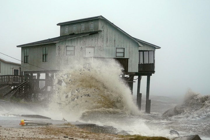 Waves wash over a house as Hurricane Michael comes ashore in Alligator Point, Florida, on Oct. 10.