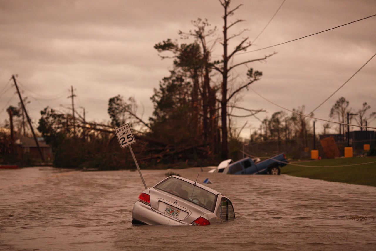 Vehicles sit partially submerged in floodwaters after Hurricane Michael hit in Panama City, Florida on Wednesday.