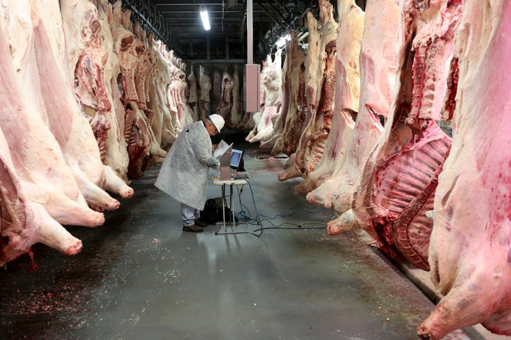 Sides of beef hang at the Cargill beef processing plant in Schuyler, Nebraska.