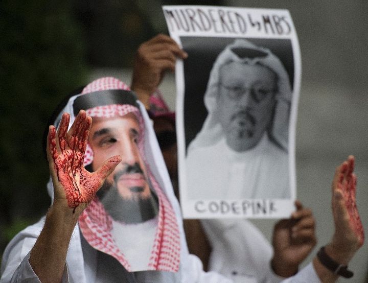A demonstrator accuses Saudi Crown Prince Mohammed bin Salman of having blood on his hands after the disappearance and suspected murder of journalist Jamal Khashoggi, a frequent critic of Saudi Arabia’s human rights abuses, in October.