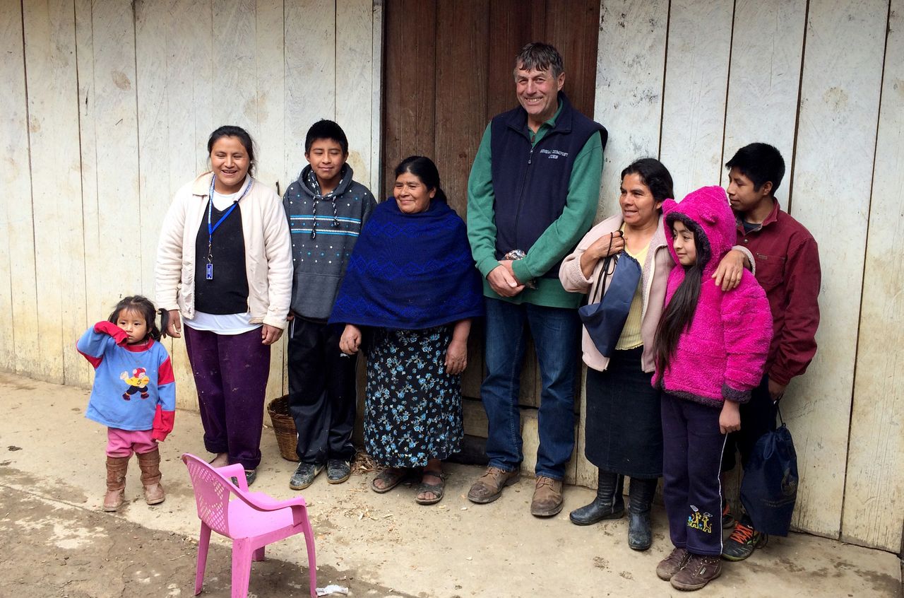 John Rosenow with the family of employee Roberto Tecpile at their home in rural Mexico in January of 2017. Rosenow made the cultural immersion trip with a program sponsored by Puentes/Bridges, Inc., to meet his employees' families and learn more about their lives.