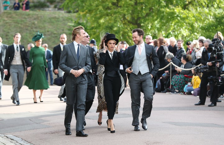 Cara Delevingne arrives ahead of the wedding of Princess Eugenie to Jack Brooksbank at St. George's Chapel in Windsor Castle.