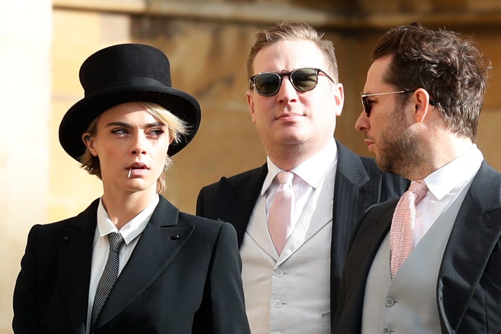 The model appeared to have a toothpick in her mouth as she made her way to the chapel. 