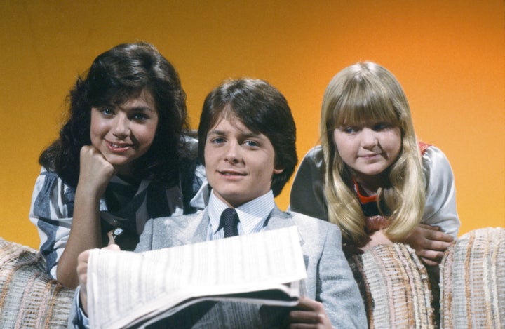 From left, Justine Bateman, Michael J. Fox and Tina Yothers in a promotional photo for "Family Ties," which aired for seven seasons on NBC.