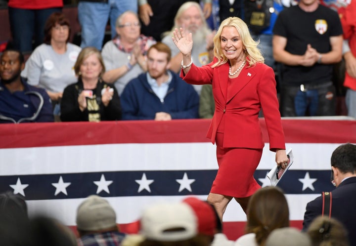 Karin Housley, Republican candidate for U.S. Senate in Minnesota, waves to the crowd at an Oct. 4, 2018, campaign rally in Rochester, Minnesota, headlined by President Donald Trump.