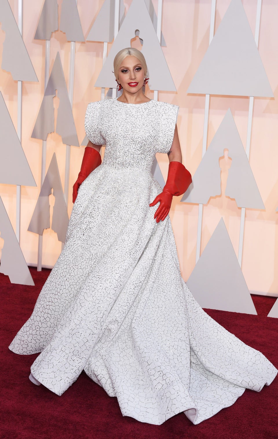 Walking the red carpet for the 2016 Oscars wearing a white Brandon, Trust  Me, Lady Gaga's Most Memorable Red Carpet Looks Deserve Your Undivided  Attention