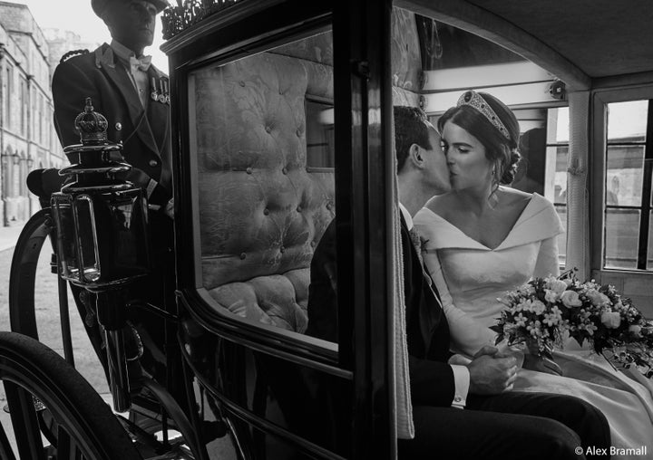 Princess Eugenie and Jack Brooksbank smooch in the Scottish State Coach as it returns to Windsor Castle following the Carriage Procession.