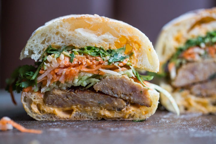 This banh mi is served on ciabatta with enormous pork meatballs, Sriracha mayo and the usual assortment of pickled veggies, cilantro and cucumber.