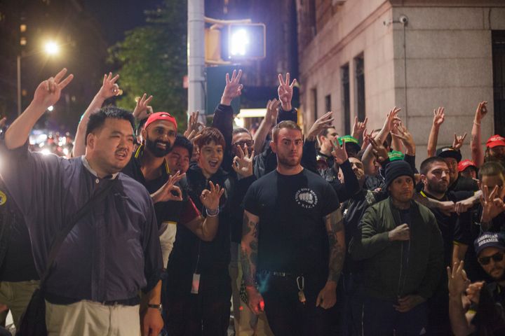 Members of the Proud Boys gather for a photo in New York City the same October night that several of them attacked protesters in the street.