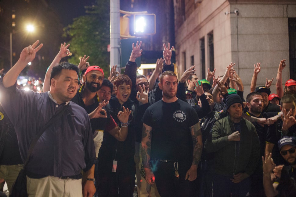 Members of the Proud Boys pose for a group photo on the night of their attack outside the Metropolitan Republican Club in New