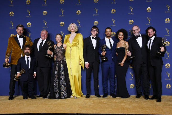 Cast and crew of “Game of Thrones” pose with their Outstanding Drama Series at the Emmy Awards on September 17, 2