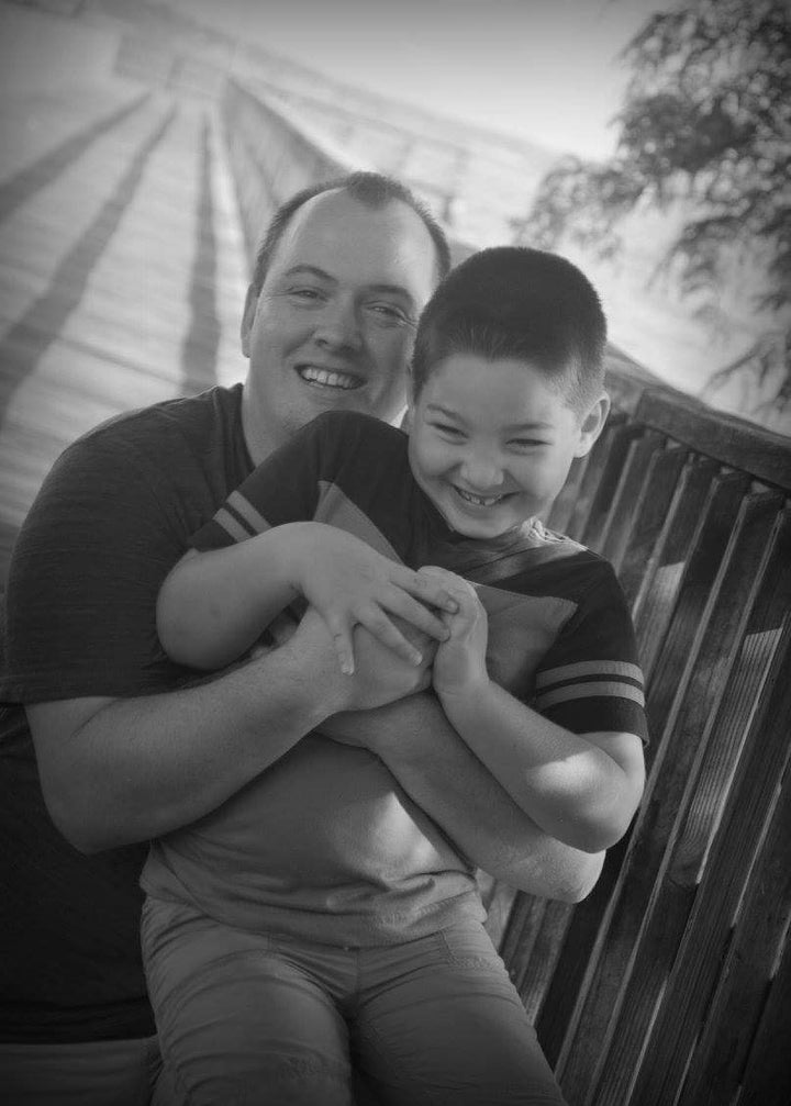 David and son Cameron sharing a laugh in 2015. 