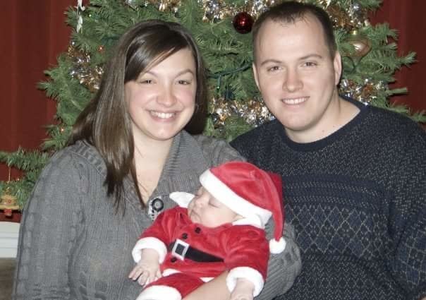 Baby Cameron in his Santa suit.