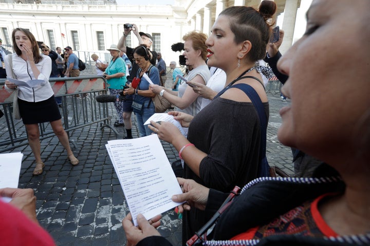 Members of the Women's Ordination Conference, a progressive Catholic group, stage a 'singing' protest during the opening of a global meeting of bishops at the Vatican, on Wednesday, Oct. 3, 2018. 