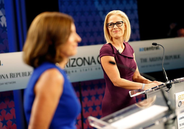 Rep. Kyrsten Sinema (D-Ariz.), right, debated Republican Martha McSally on Monday night. They are competing for the Senate seat now held by Jeff Flake.