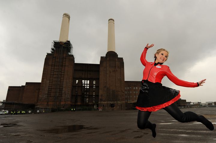 Helen Skelton walked a 150m long, 66m high tightrole between the chimneys of Battersea Power Statio.