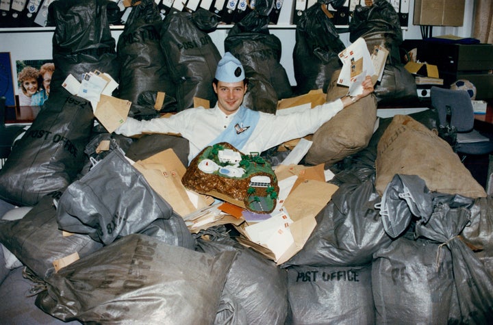 Blue Peter presenter John Leslie with the Tracy Island model and bags of letters requesting the instructions how to make it