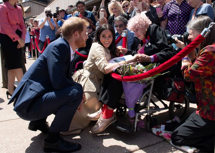 The Duke and Duchess of Sussex chat with Daphne Dunne. 