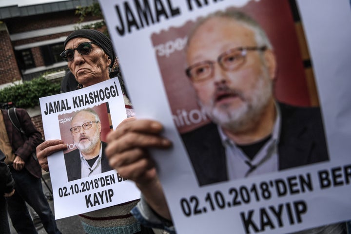 Protesters hold a portrait of missing journalist and Riyadh critic Jamal Khashoggi reading "Jamal Khashoggi is missing since October 2" during a demonstration in front of the Saudi Arabian consulate on Oct. 9, 2018, in Istanbul.