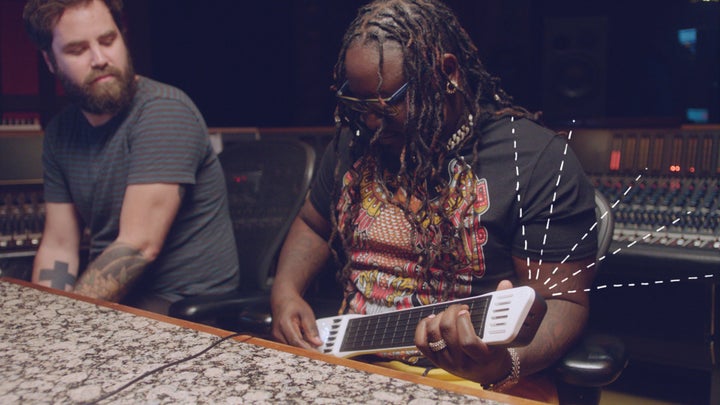 T-Pain toys with a digital guitar on his new show.