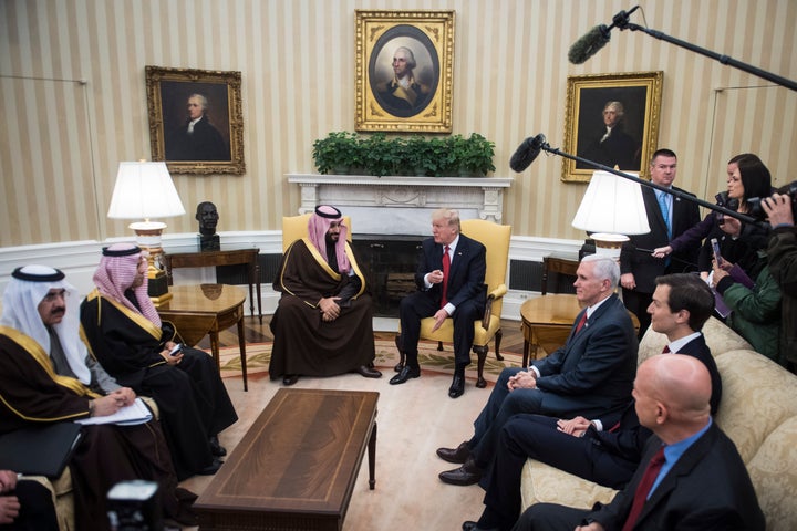 President Donald Trump meets with Saudi Defense Minister and Deputy Crown Prince Mohammed bin Salman bin Abdulaziz Al Saud in the Oval Office of the White House in Washington, D.C., on Tuesday, March 14, 2017. Vice President Mike Pence, center right, and White House senior adviser Jared Kushner, right, listen.