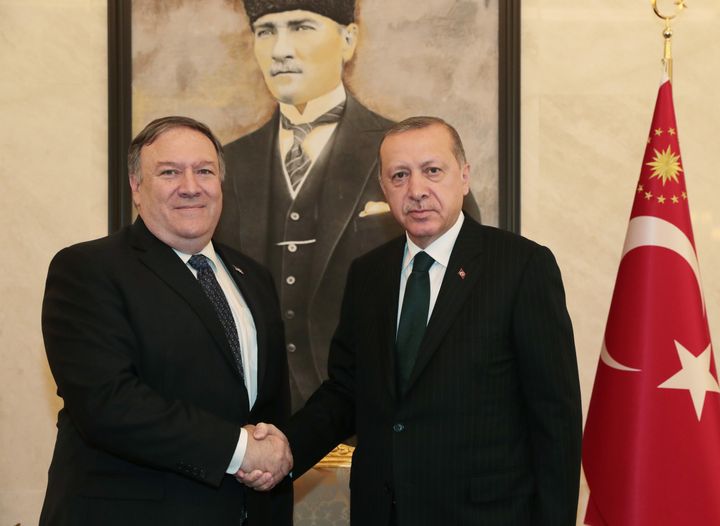 Turkish President Recep Tayyip Erdogan and Secretary of State Mike Pompeo shake hands in Ankara, Turkey on October 17, 2018.