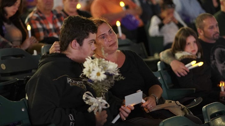 Kimberly Ruediger holds her son Gabriel, as they participate in an October 2017 candlelight vigil in Camden, New Jersey, in remembrance of those who have died from drug overdoses. The opioid epidemic is killing nearly 200 people every day. Nationwide, almost half of the deaths involved the powerful synthetic drug fentanyl in 2017. 