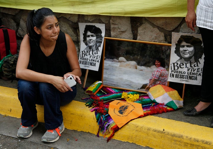 Laura Zuniga Caceres, daughter of Honduran indigenous and environmental rights activist Berta Caceres, sits outside the court where eight men accused in her mother's murder were to be tried in Tegucigalpa.