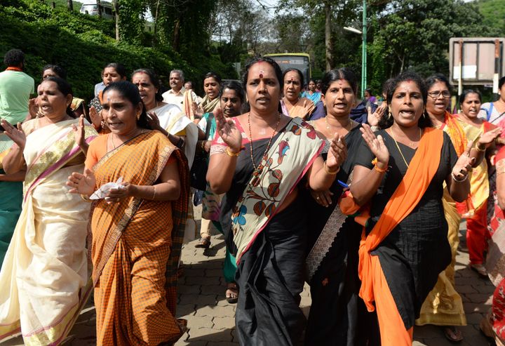 Female devotees also protested against the decision to allow women between ages 10 and 50 to enter Sabarimala.