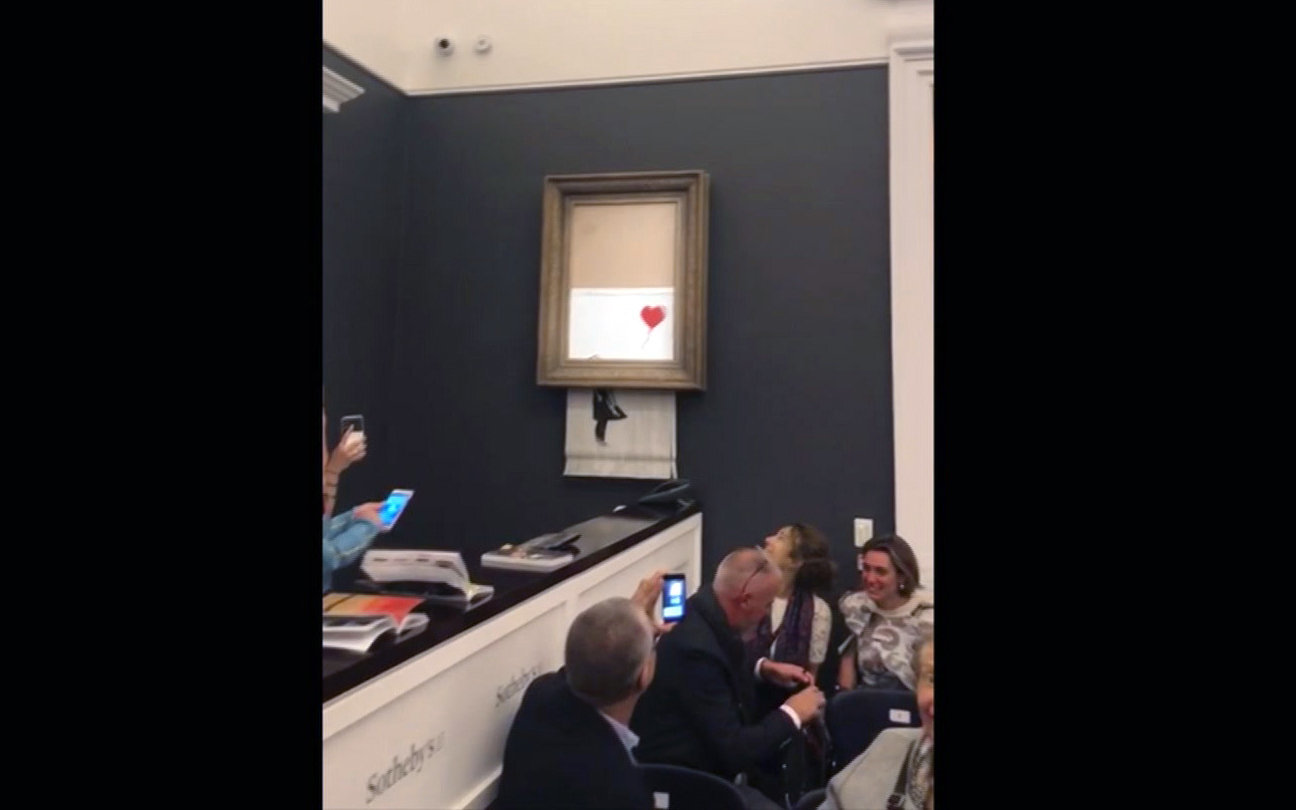 New Banksy Video Suggests Shredded Painting Stunt Didn't Go Entirely To ...