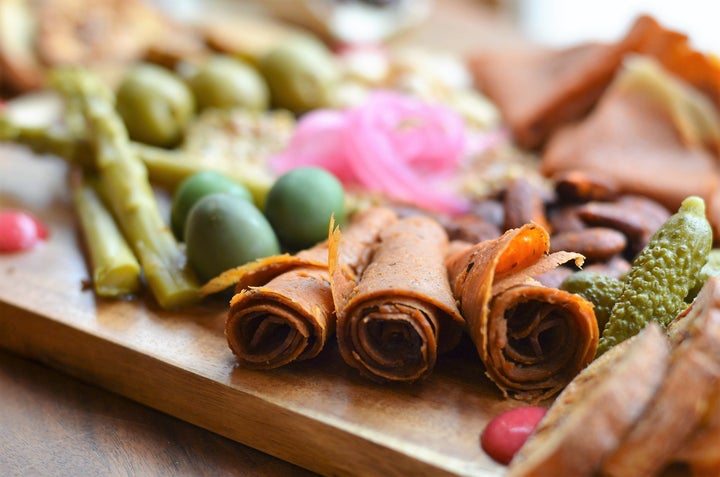 A plate of vegan charcuterie from Herbivorous Butcher in Minneapolis.