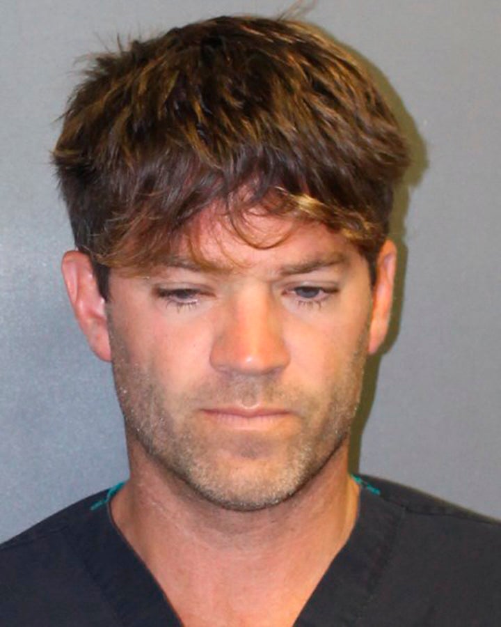 This undated booking photo provided by the Newport Beach, Calif., Police Department shows Grant Robicheaux.