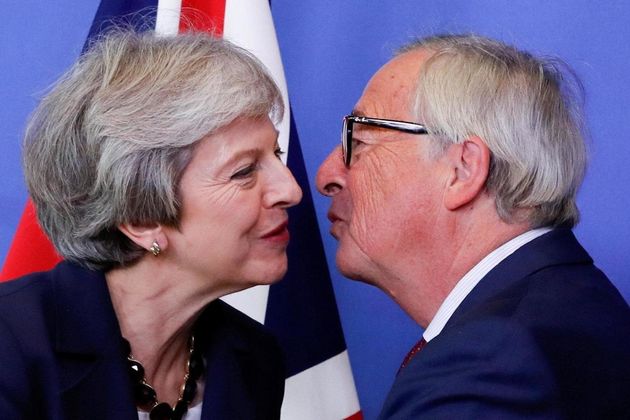 Theresa May with President of the EU Commission Jean-Claude Juncker at the summit in Brussels this week 