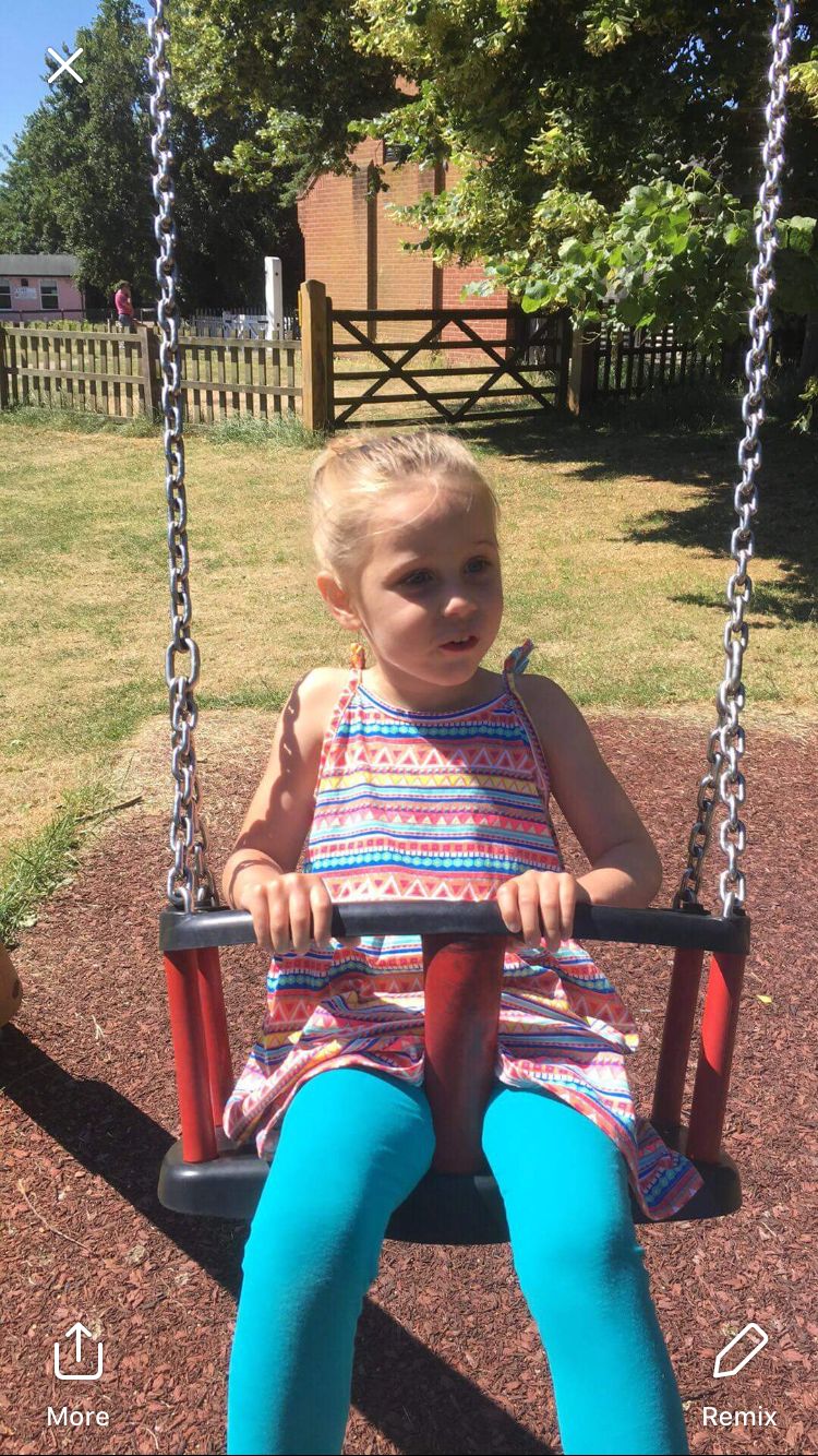 Indie-Rose Clarry on a swing