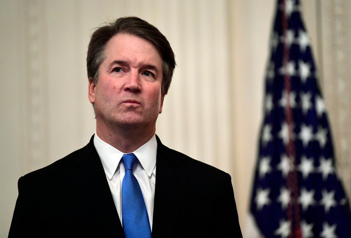 Supreme Court Justice Brett Kavanaugh stands before a ceremonial swearing-in on Monday, Oct. 8, 2018.