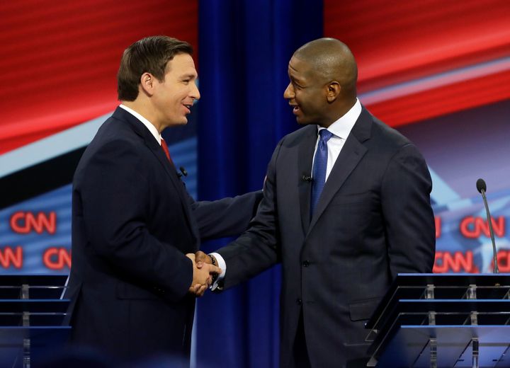 Ron DeSantis and Andre Gillum shake hands Sunday at the first debate in the Florida governor's race.
