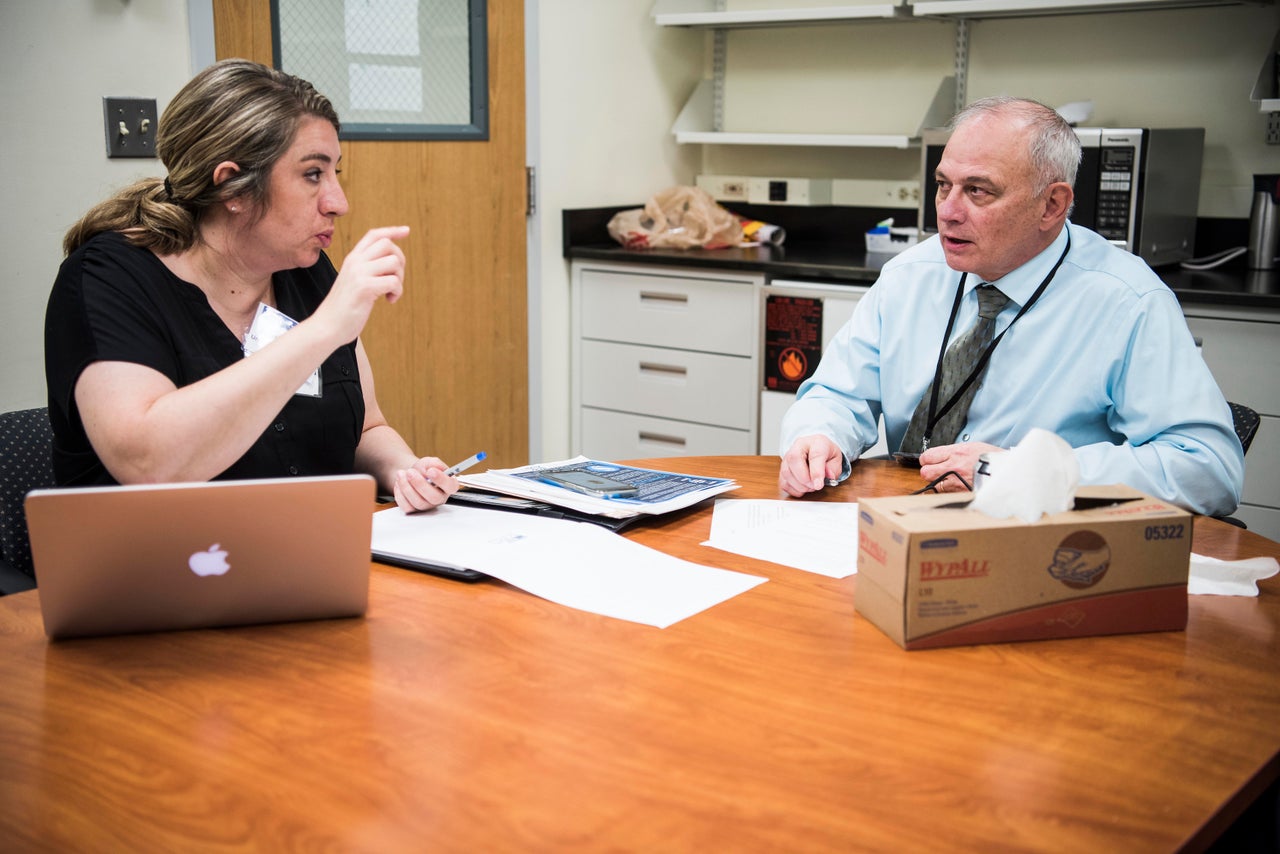 Amber spars with Dr. William Gahl, clinical director of the National Human Genome Research Institute at the NIH. Gahl meets with only one or two parents a year outside of his clinical and research work.