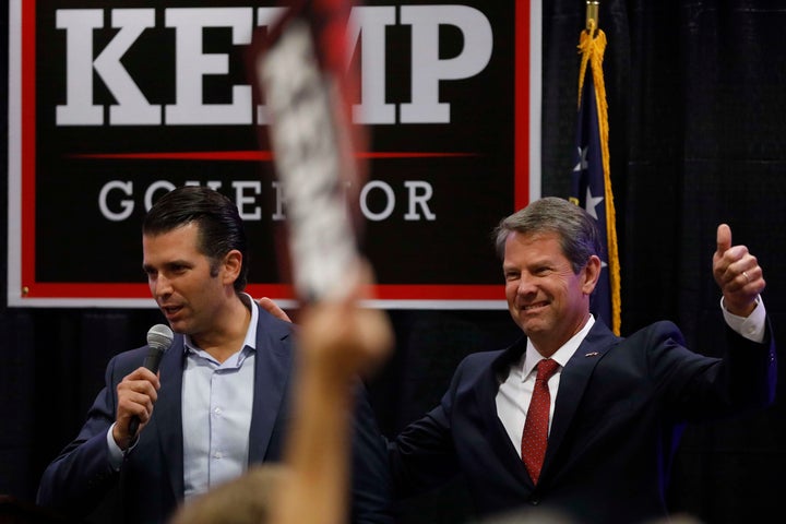 Donald Trump Jr. (left) at a rally for Republican gubernatorial nominee Brian Kemp, in Athens, Georgia, Oct. 9. Currently Georgia's secretary of state, Kemp has held up registrations for 53,000 voters, 70 percent of whom are African-American.