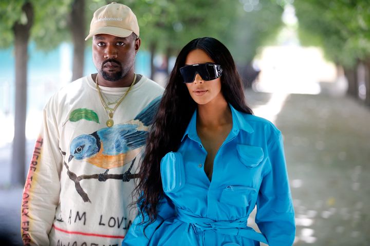 Kanye West and Kim Kardashian attend Paris Fashion Week in June 2018. 