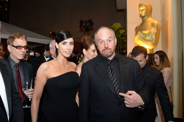 Sarah Silverman and Louis C.K. at the Oscars in 2016. Silverman said Louis C.K. used to masturbate in front of her when they were both aspiring comedians, but the situation was different because it was consensual and “he could offer me nothing.”