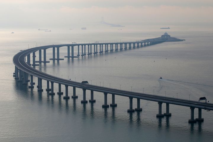 The 34-mile Hong Kong-Zhuhai-Macau bridge was officially opened on Tuesday.