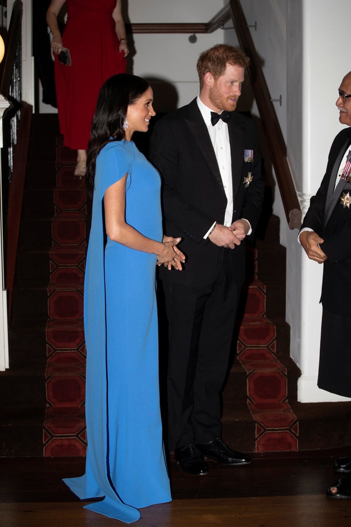 A shot of the duchesses' caped dress. 