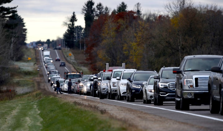 Volunteers line up along Highway 25 just north of Barron on Oct. 23, 2018, to assist in the search for Jayme Closs.