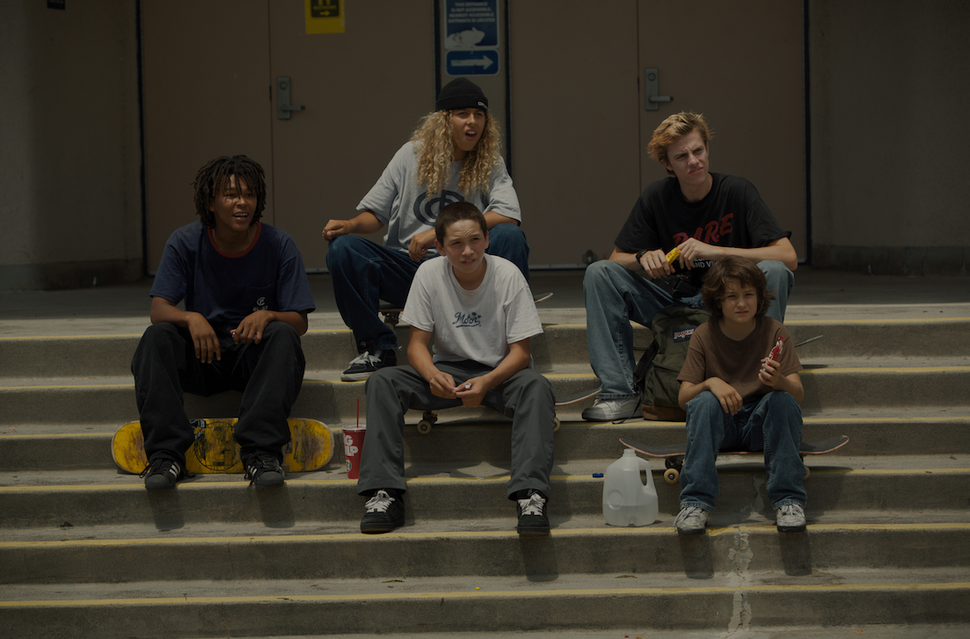 Stevie (bottom right) and his four new friends stare at a security guard trying to get them to leave the school. 