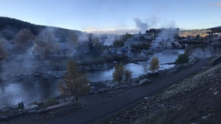 Steam rises off the San Juan River, released from the hot springs that give Pagosa Springs its name. A local forest health co