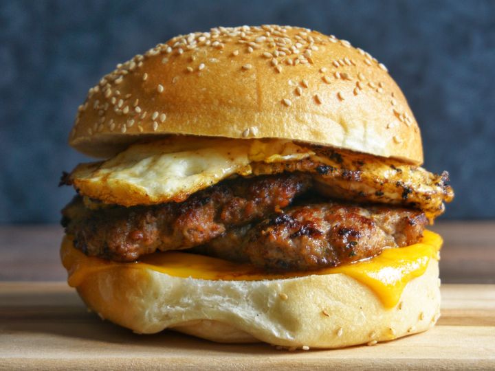 A hot tasty melty cheesy meaty mess on a bun, yum.